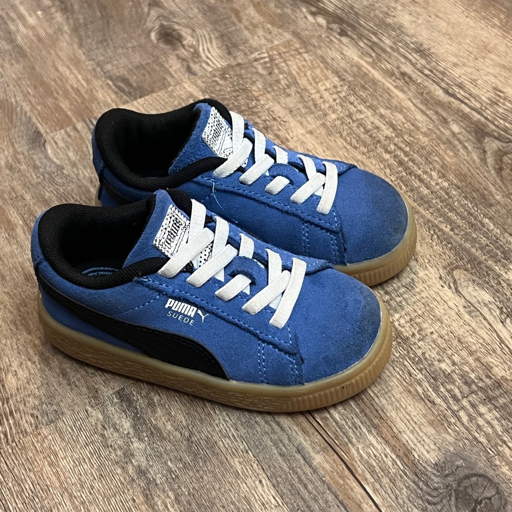 Children’s size 7C PUMA sneakers. - slightly worn